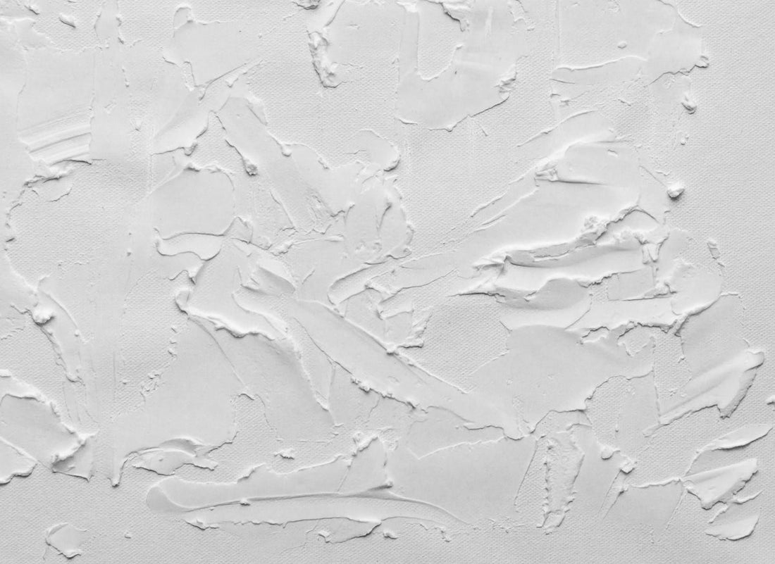 a white painted wall with white paint on it