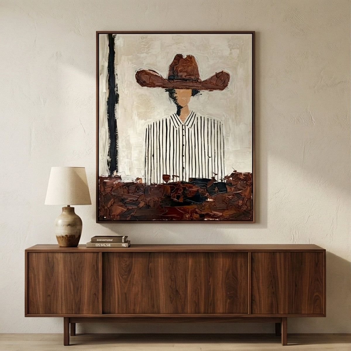 3D impasto palette knife figure canvas artwork anchored above a brick fireplace mantel in a mountain cabin.