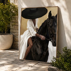 Equine woman on black horse canvas featuring a lady in a white dress and black brim hat riding a horse