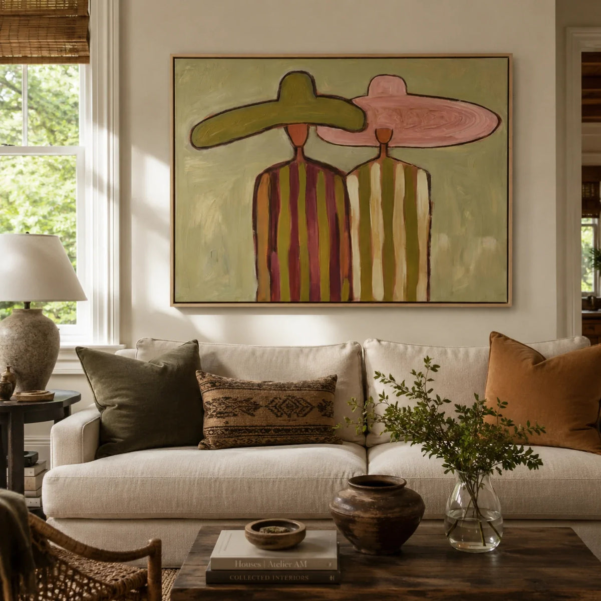 Oversized retro green and pink figure painting bringing cozy artistic character above a master bedroom headboard.