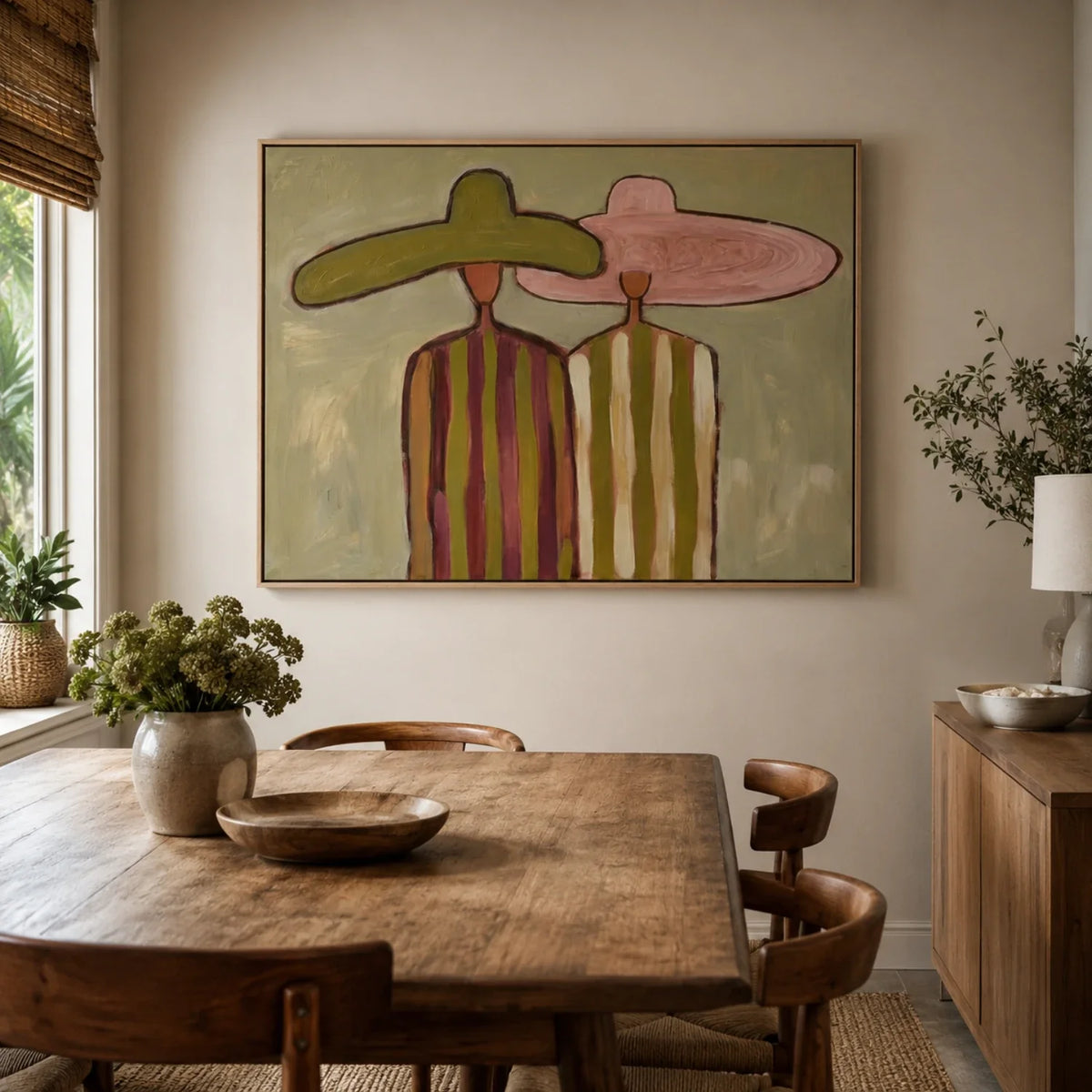 Modern Southwestern lady portrait print effortlessly completing a rustic dining room setup near a wooden table.