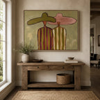 Abstract woman in hat canvas painting bringing refined vintage charm to a brick fireplace mantel in a cabin.