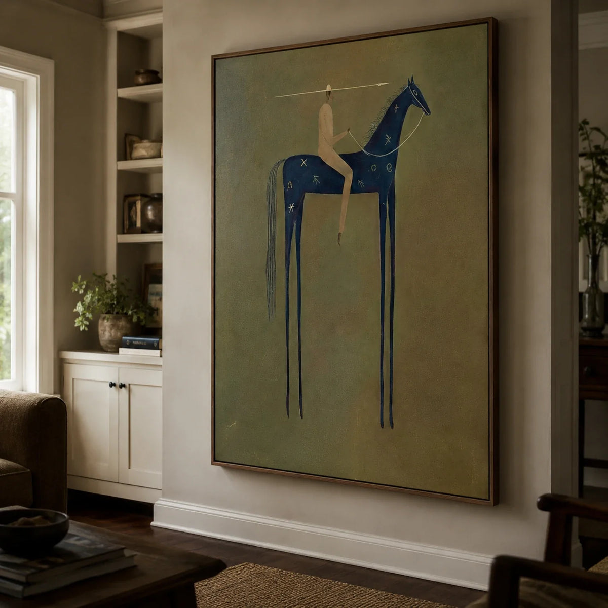 Minimalist folk horse figure painting adding warm earthy tones over a wooden living room sideboard.