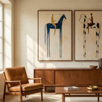 Large 2-piece abstract figure wall art set creating a stunning gallery wall center above a living room sofa.