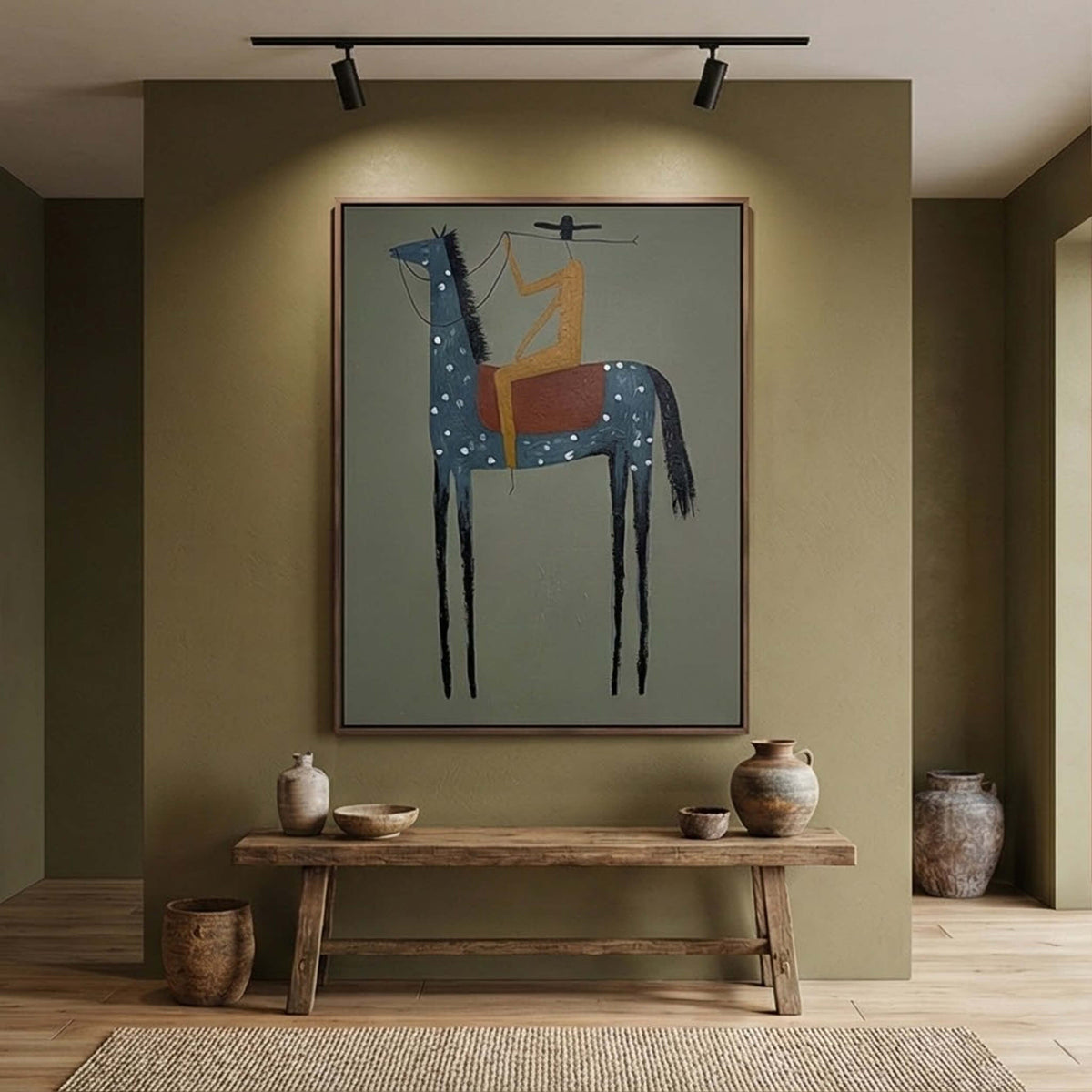 Folk art style cowboy riding horse canvas framed above an oak dresser in a sunlit master bedroom