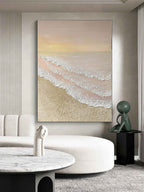 Calm vertical pastel ocean wave textured art piece hanging over a king-size bed setup in a cozy cream bedroom