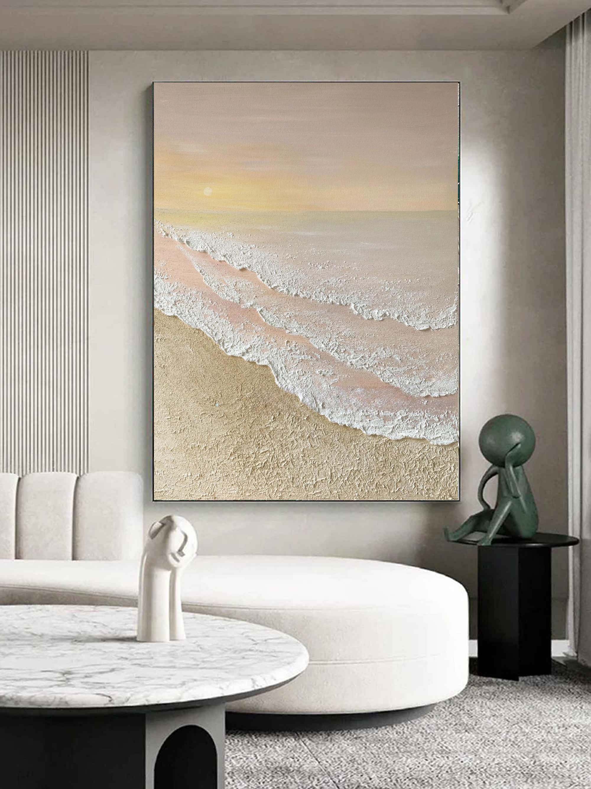 Calm vertical pastel ocean wave textured art piece hanging over a king-size bed setup in a cozy cream bedroom