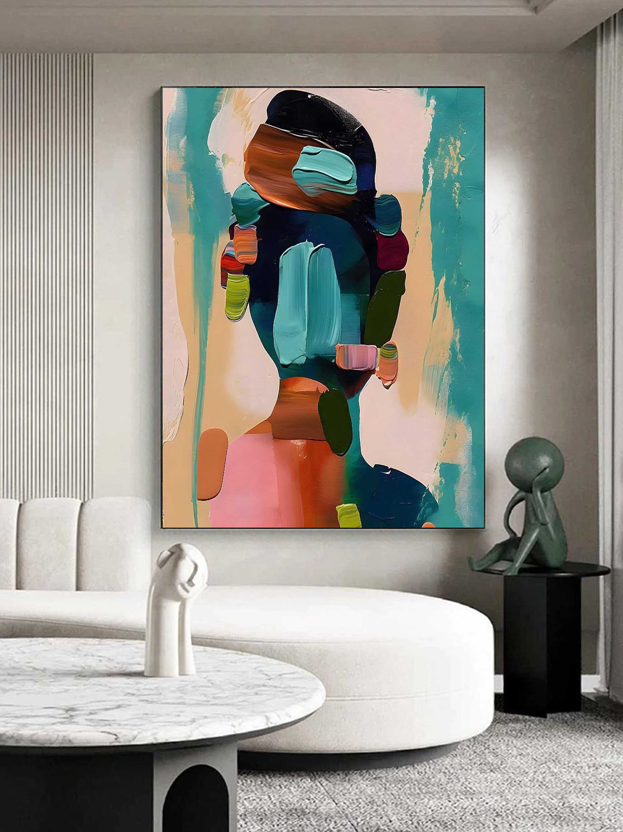 Colorful thick palette knife textured figure painting creating an elegant artistic focal point in a master bedroom.