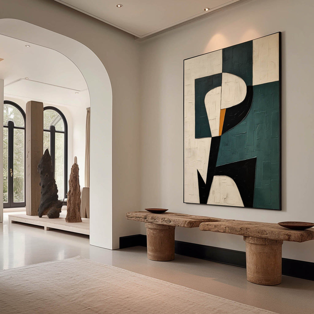 Framed hand-painted contemporary neutral abstract painting styled in a luxury modern dining room