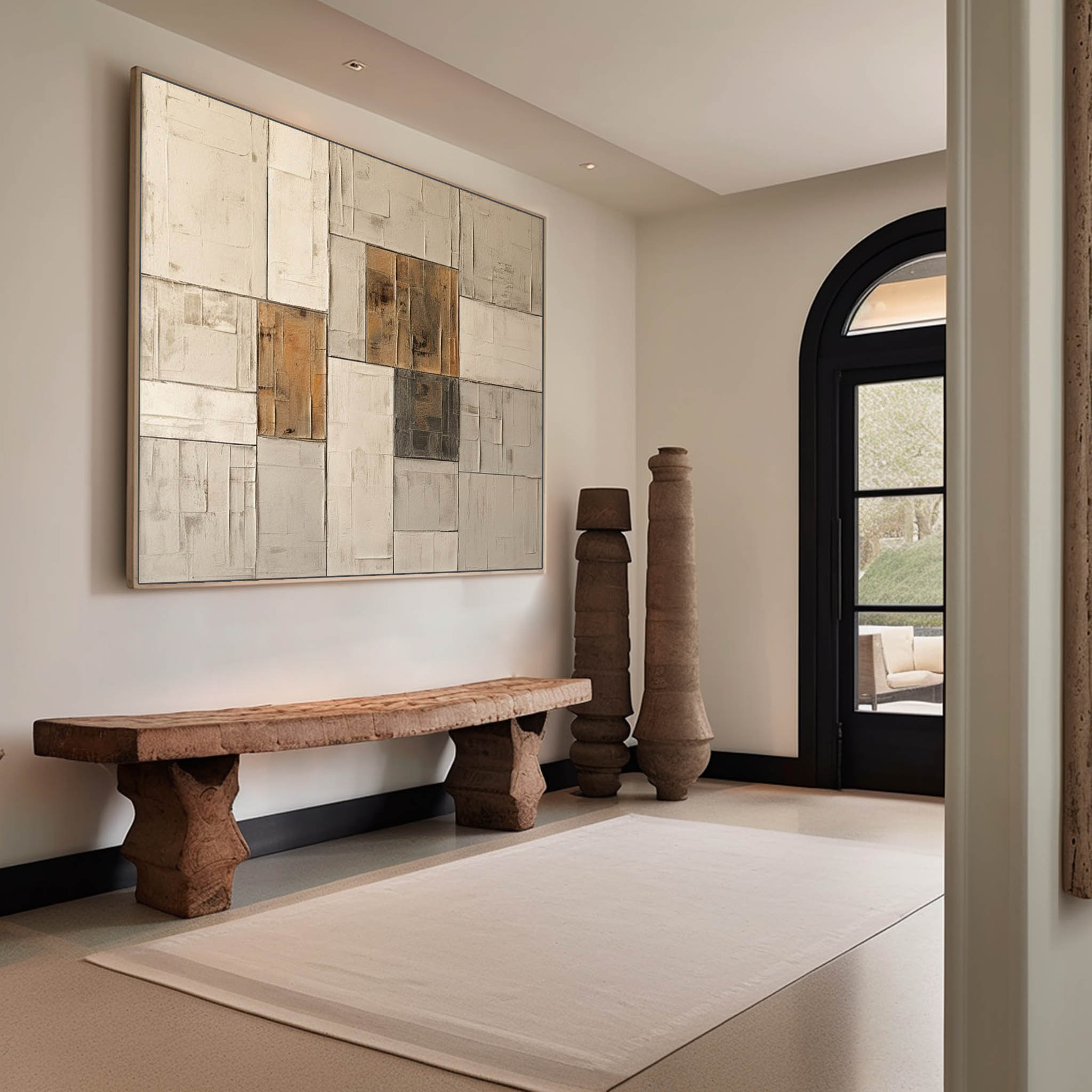Large neutral cream abstract geometric block painting hanging above a minimalist sofa in a modern living room