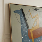 Modern Western horse rider canvas painting displayed above a cognac leather sofa in a rustic modern living room