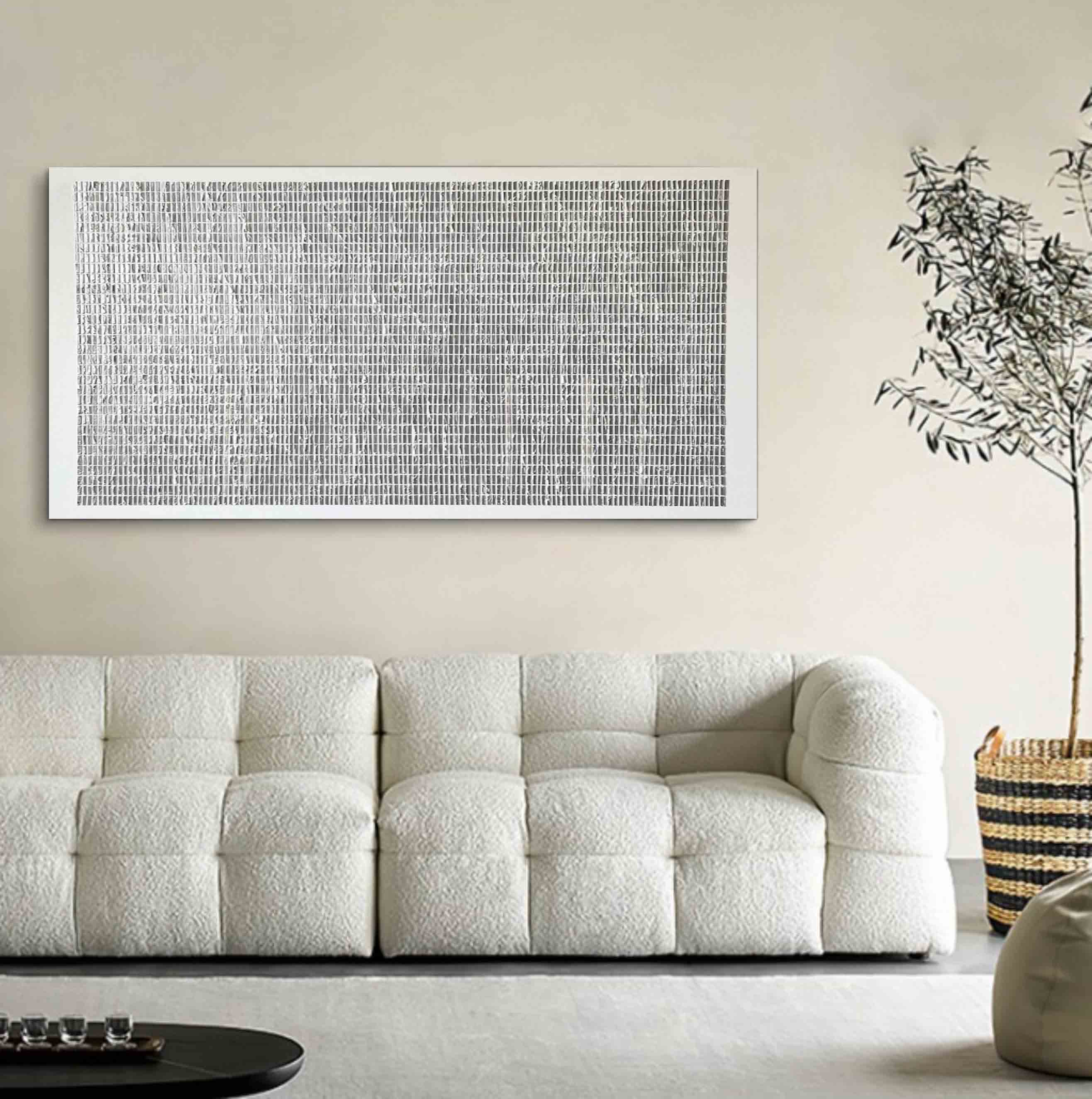 Restful neutral 3D plasterwork introducing a layer of understated elegance above an airy master bedroom bed setup.