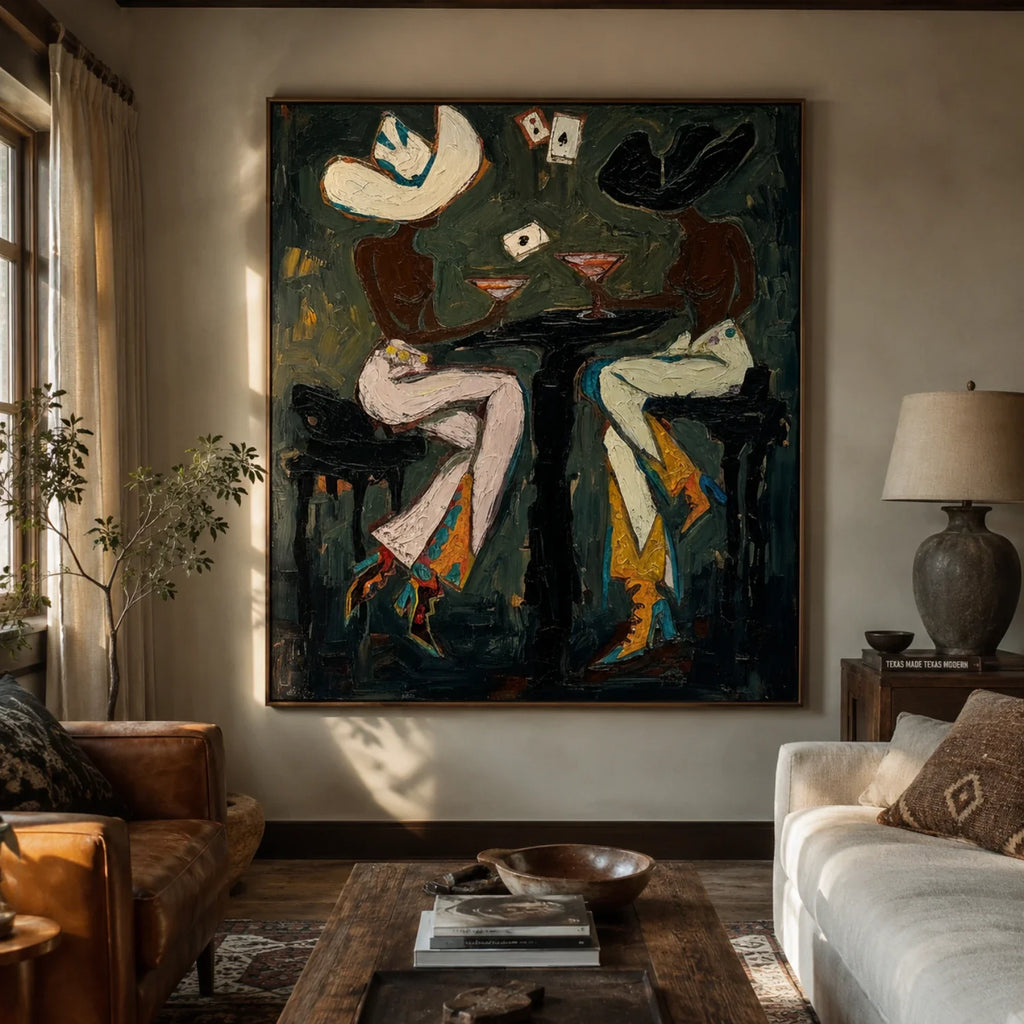 Retro Western figure wall decor creating a moody focal point above a cognac leather sofa in a rustic basement lounge