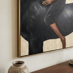 Large beige western equestrian canvas painting mounted above a stone fireplace mantle in a cozy rustic den