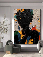 Vibrant heavy palette knife textured portrait painting creating a powerful artistic statement in a bedroom.