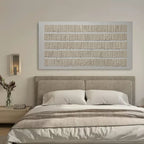 Close-up of Strata textured wall art showing handcrafted vertical plaster ridges and organic surface texture