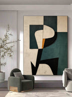 Modern minimalist Japandi canvas painting styled above a neutral fabric sofa in a luxury living room