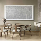 Sophisticated extra wide clay-based textured artwork creating a tailored background inside a contemporary dining space.
