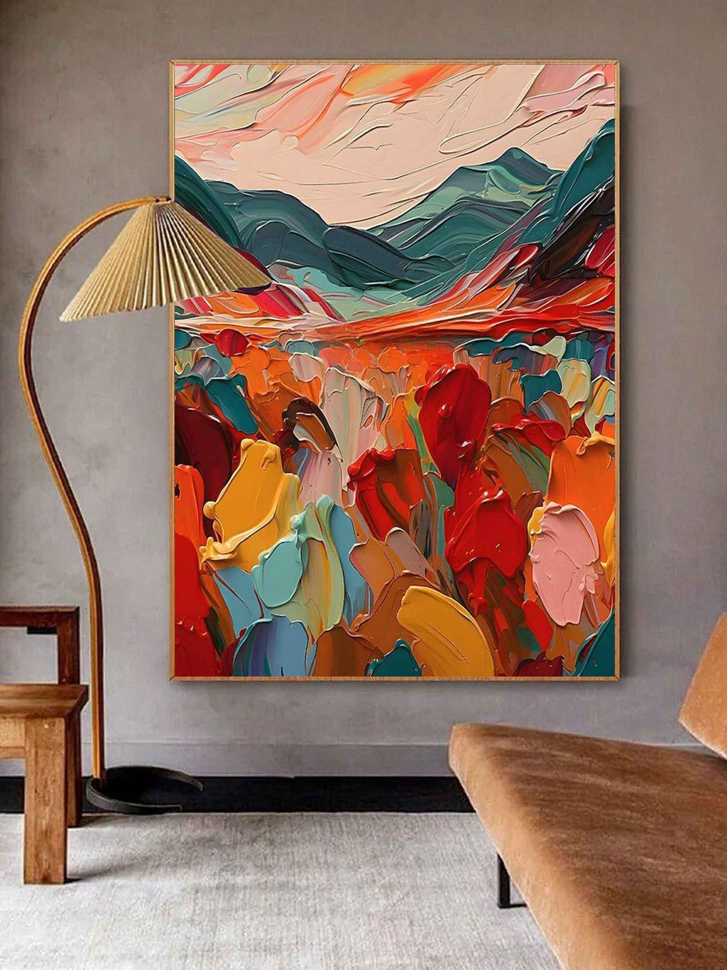 Vibrant orange and green sunset landscape impasto wall art displayed in a contemporary dining room next to minimalist decor