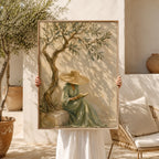 Solitude olive tree woman plaster wall art featuring a lady reading under an olive tree on textured beige canvas
