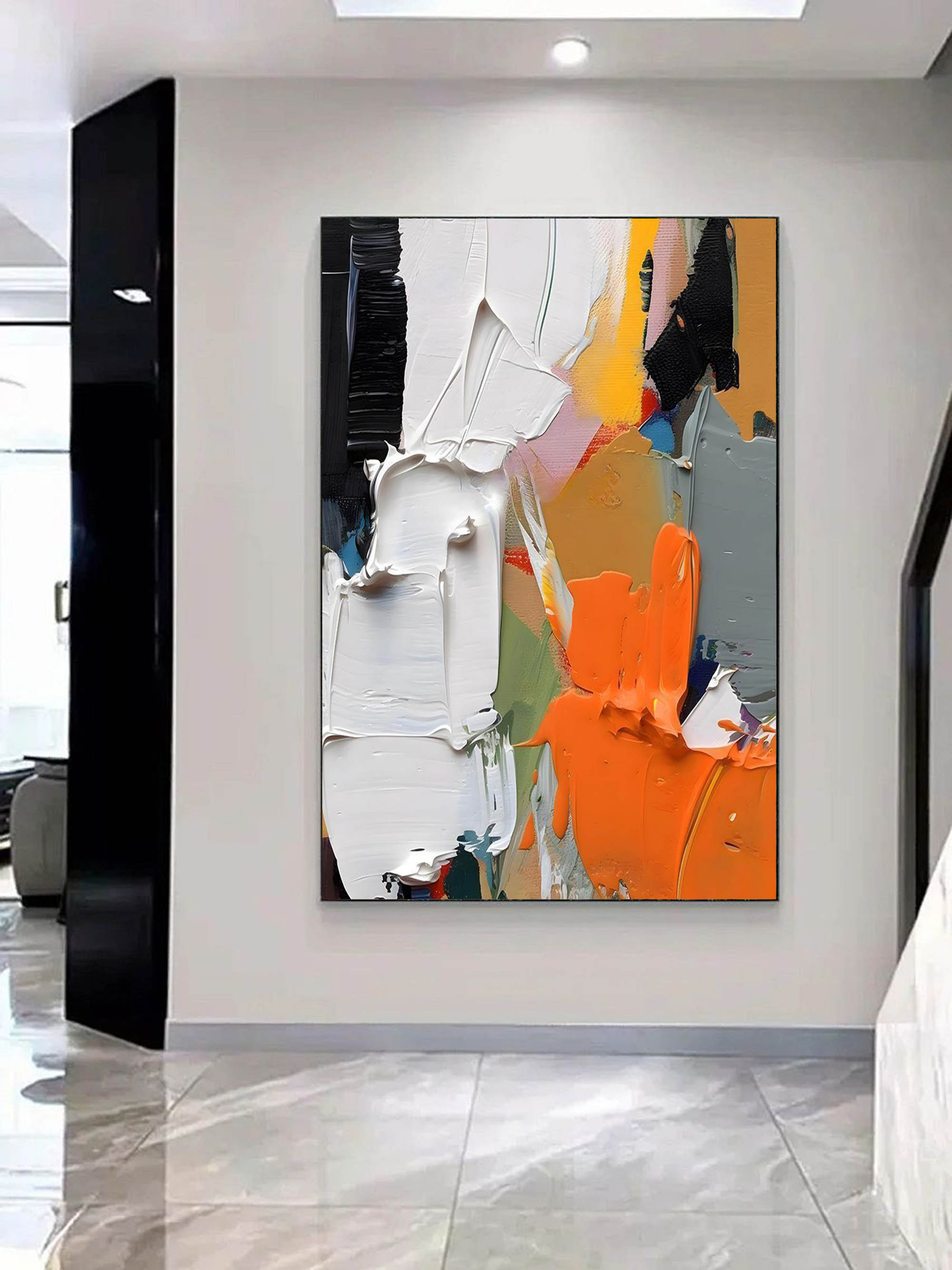 minimalist entryway wall display with framed bright abstract geometric artwork