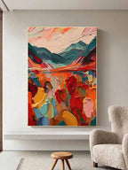 Modern colorful abstract oil artwork mounted above a wooden console table in a minimalist home entryway with gallery lighting