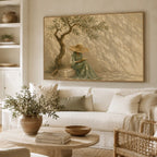 Mediterranean olive tree woman canvas painting displayed above a beige linen sofa in a warm Wabi Sabi living room