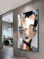 Feminine bold stroke abstract profile artwork hanging on a neutral tone entryway gallery wall