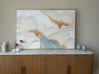 Close-up detail of heavy texture plaster artwork showing exquisite gold foil and cream white canvas petals