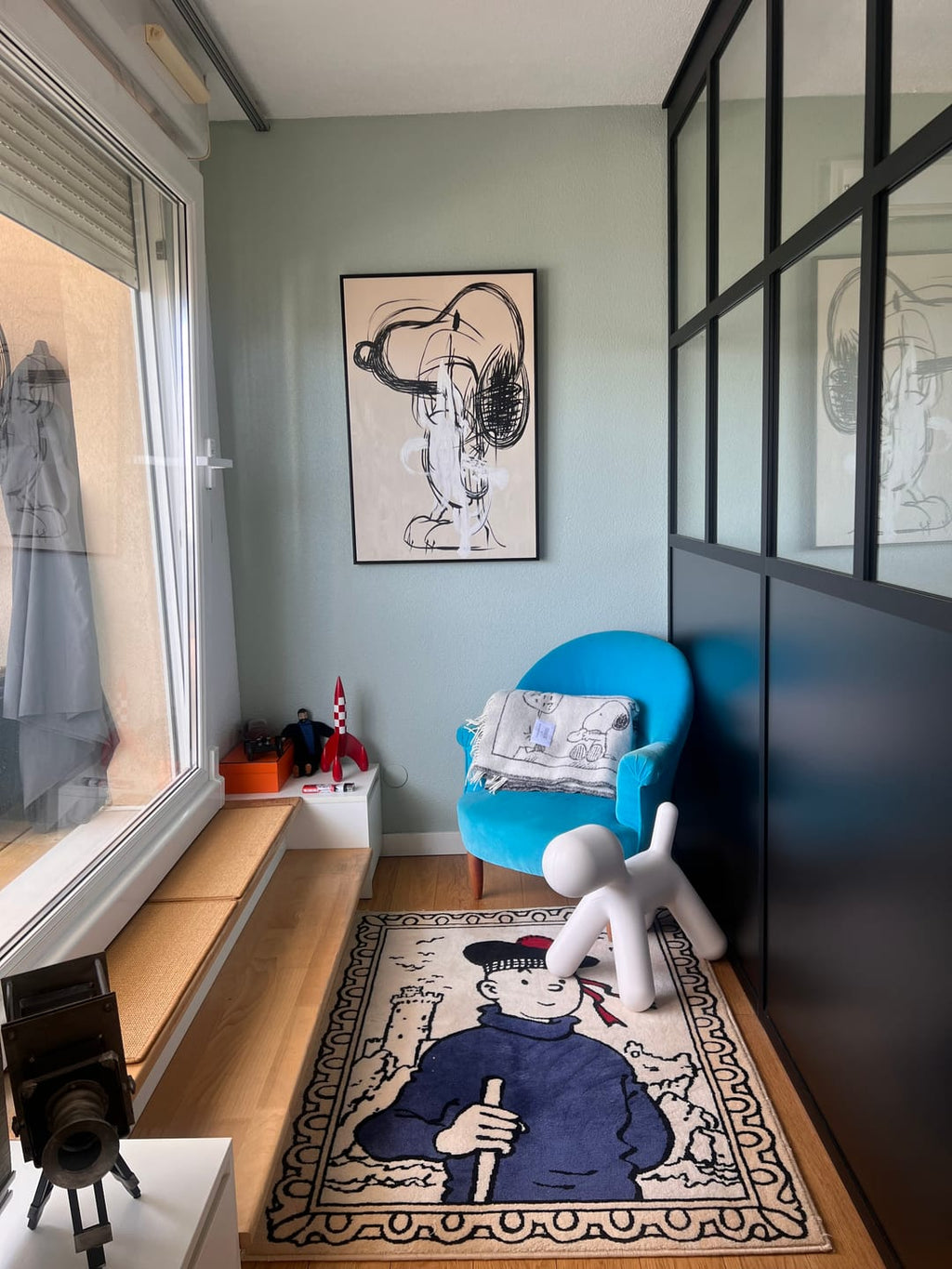 A large abstract textured wall art painting of a puppy, hung in a Children's Room.