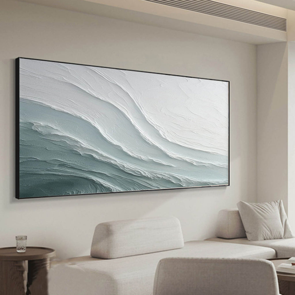 Horizontal wabi-sabi wall art displayed above sofa in modern minimalist living room interior