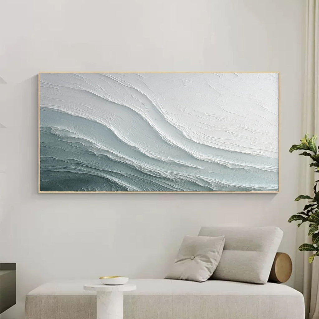 Textured abstract wave canvas artwork in serene bedroom with soft natural lighting