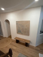 Large Wabi Sabi textured wall art painting, hung on the bench in the hallway.