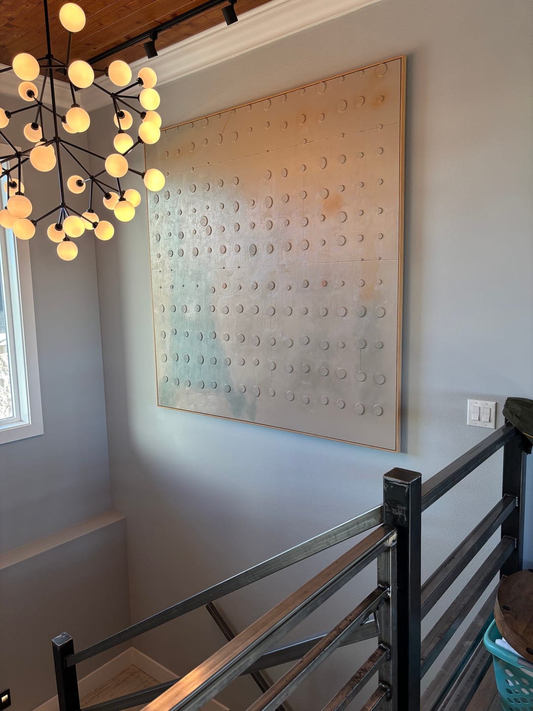 Minimalist 3D Wabi Sabi  plaster wall art painting, hung in the modern staircase.