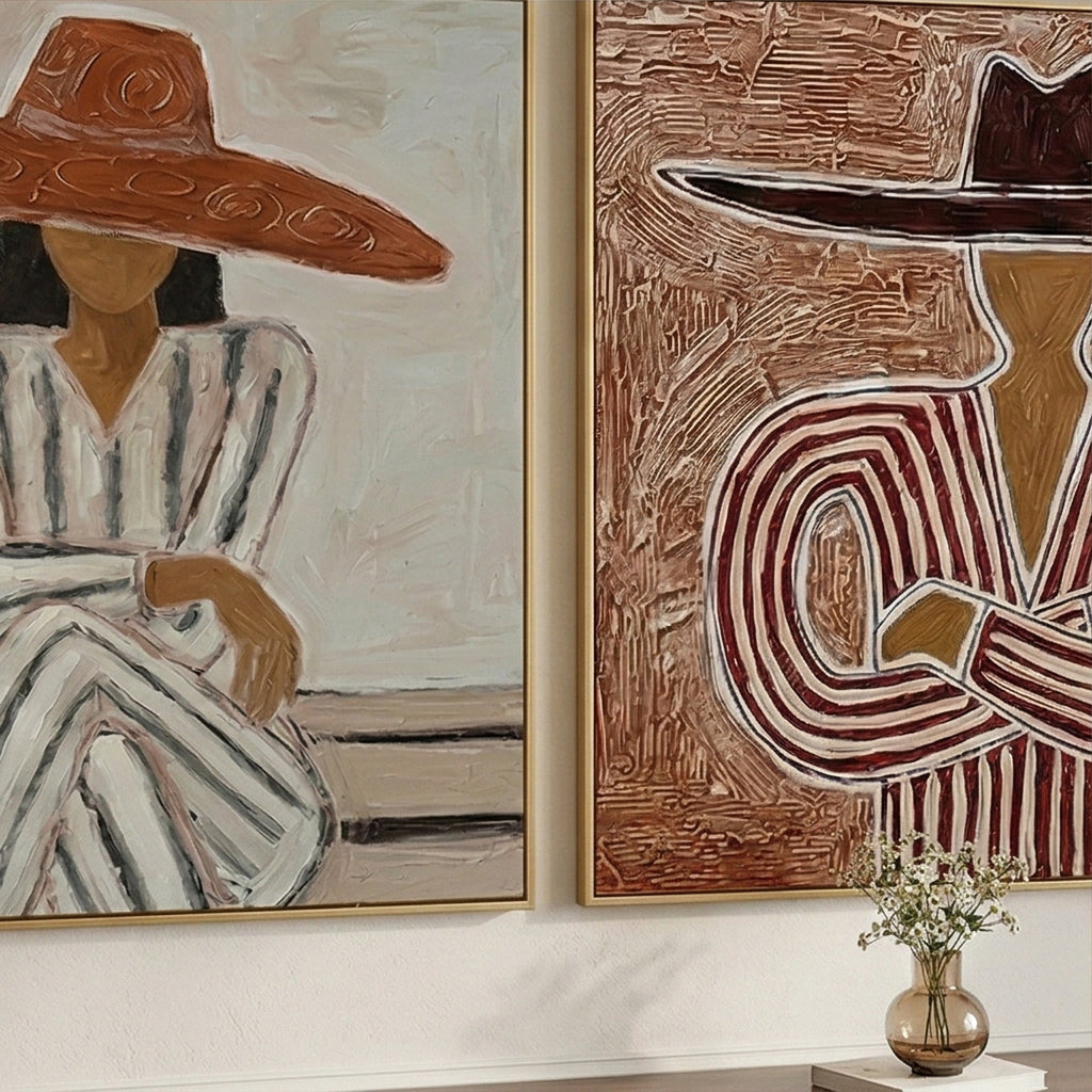 Minimalist textured cowboy and cowgirl canvas art set displayed above the bed frame in a boho bedroom