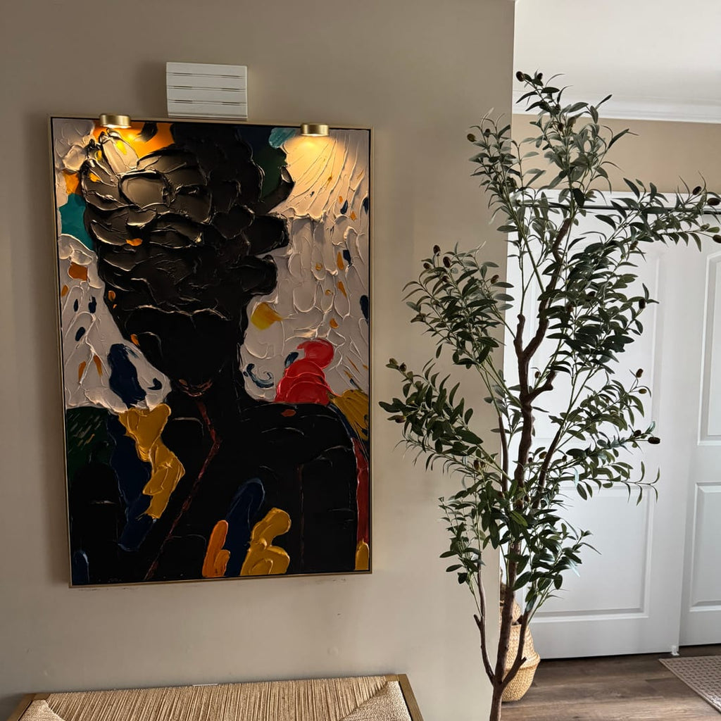 Vibrant heavy palette knife textured portrait painting creating a powerful artistic statement in an entryway.