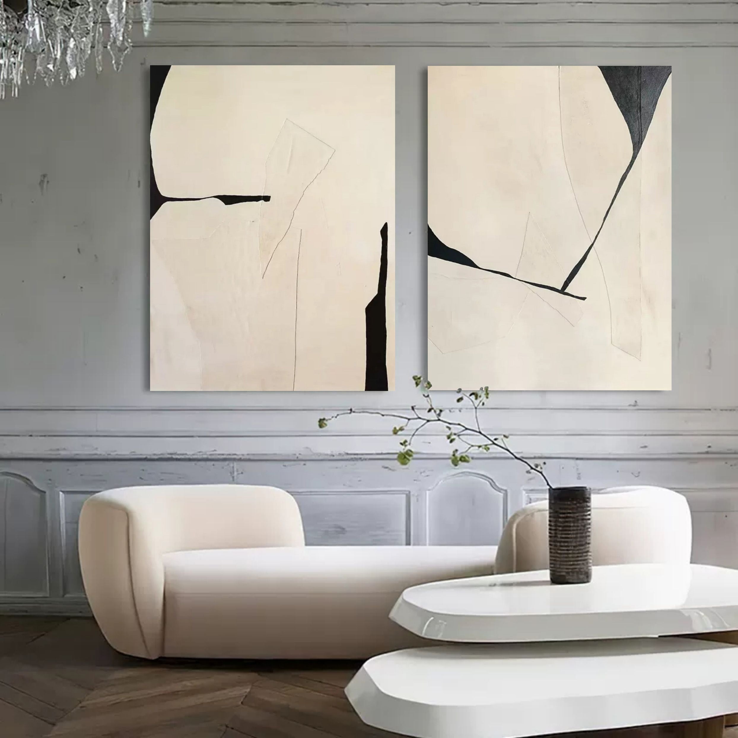 Neutral tone textured wall art diptych creating a calm aesthetic over a master bedroom headboard.