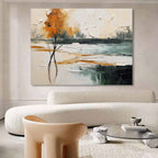 Heavy textured colorful nature landscape canvas artwork styled above a neutral linen sofa in a bright modern living room