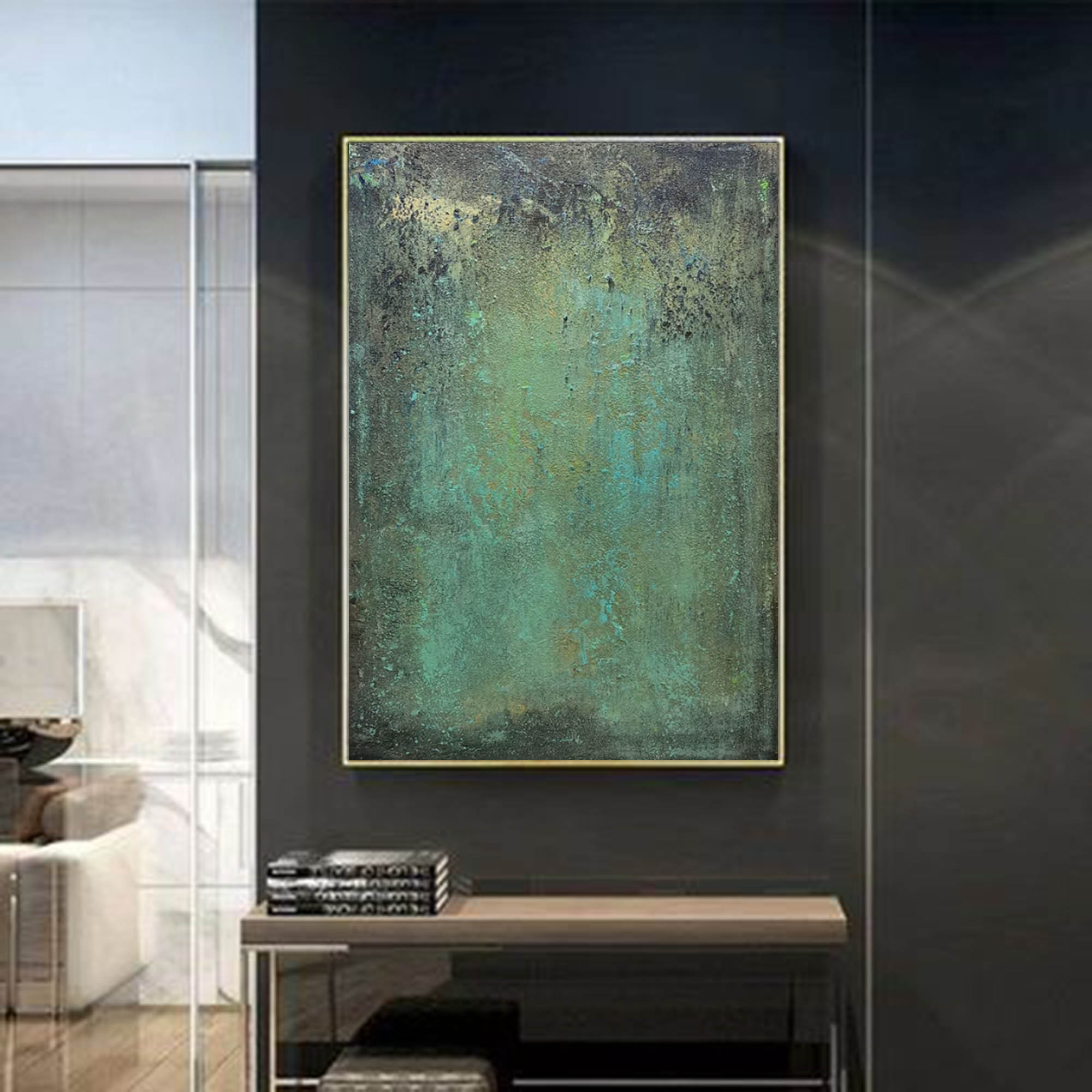Abstract green textured wall art displayed above sofa in modern minimalist living room interior