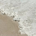 Close-up macro shot showing detailed 3D plaster wave crests and thick textured sand effects of Parge Art canvas.