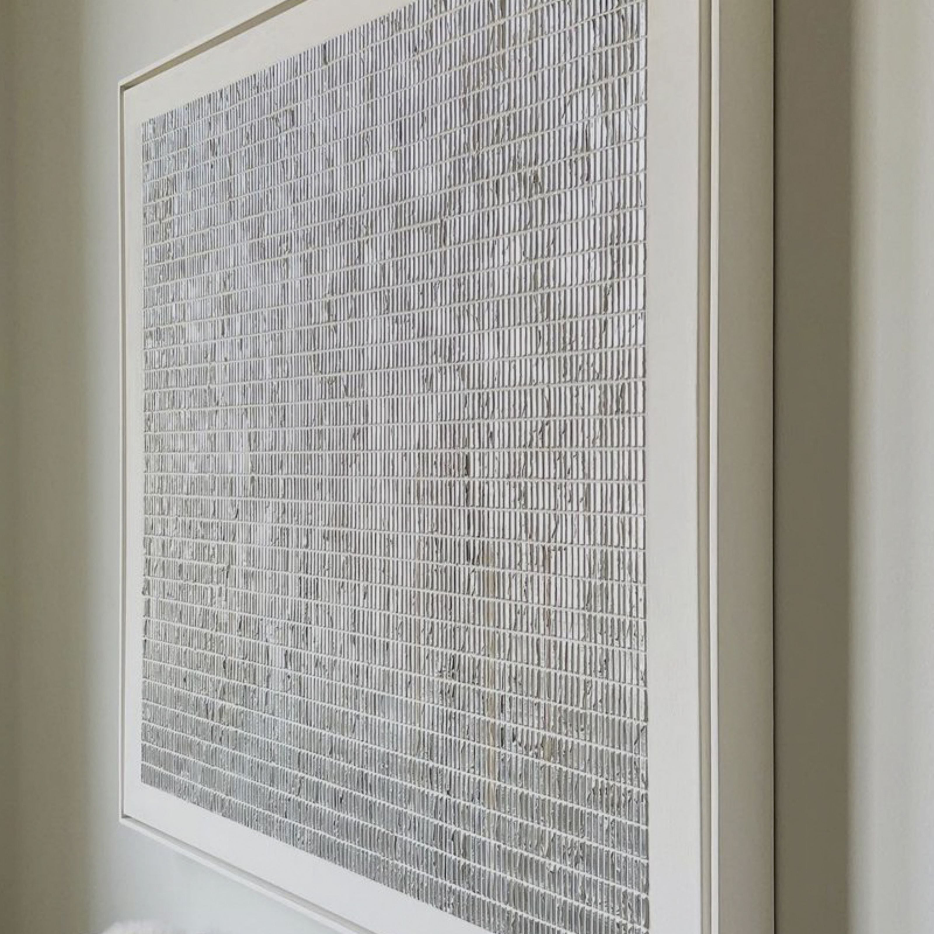 minimalist bedroom interiors with neutral plaster grid textured canvas art