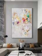 Elegant gold foil abstract impasto wall art displayed in a contemporary dining room next to minimalist gallery decor