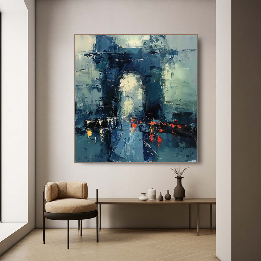 Large abstract cityscape canvas painting perfectly styled above a comfortable sofa in a sunlit modern living room