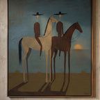 Moody Southwestern cowboy horseback canvas painting displayed above a dark brown leather sofa in a rustic living room