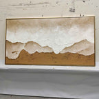 Sophisticated heavy textured panoramic coastal artwork adding calm inspiration and organic design to a home office.