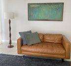 Sophisticated heavy textured panoramic green artwork adding deep inspiration and organic design to a home office.