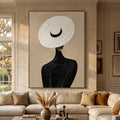 Socialite woman in sun hat plaster wall art featuring a lady with a large white hat and black dress on beige textured canvas