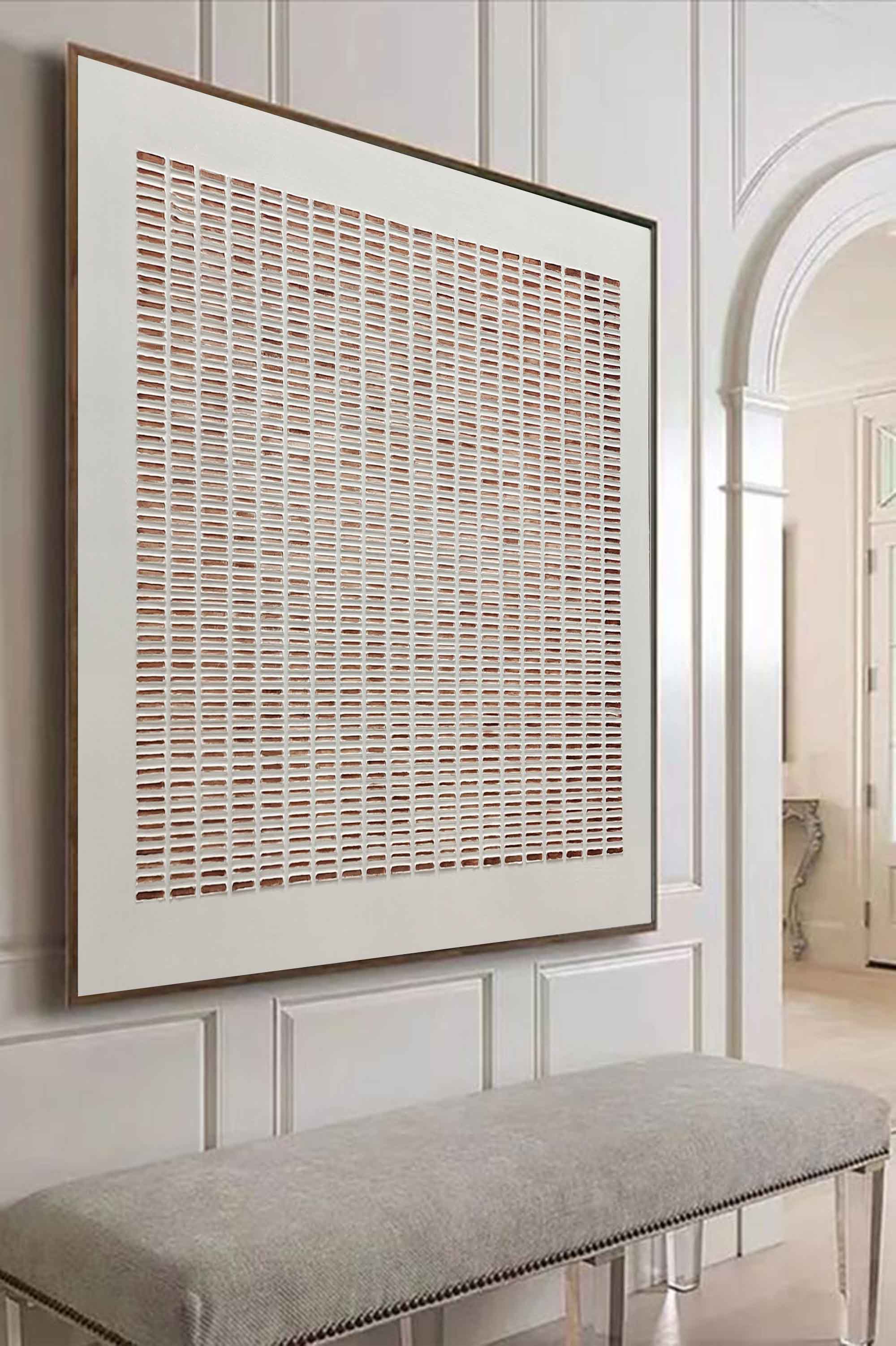 Large minimalist neutral geometric canvas artwork beautifully framed and hung above a living room sofa.